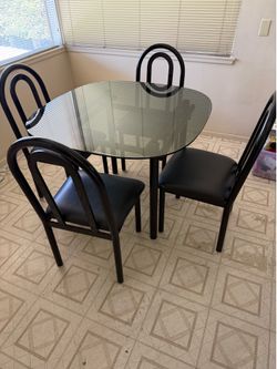 Four place dining room table