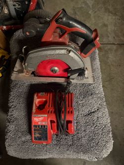 Milwaukee saw and charger
