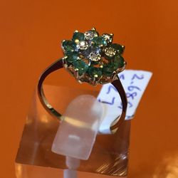 14k gold ring,5diamond & 11 Emerald,2.70 grams,size 7,please look at all pictures for more details