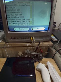 NINTENDO WII WITH SUPER NINTENDO GAMES INSTALLED