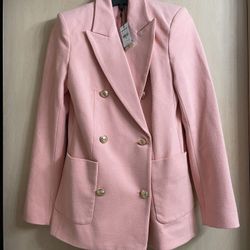 New with tags women’s size XS Express Blazer. Peach colored. 