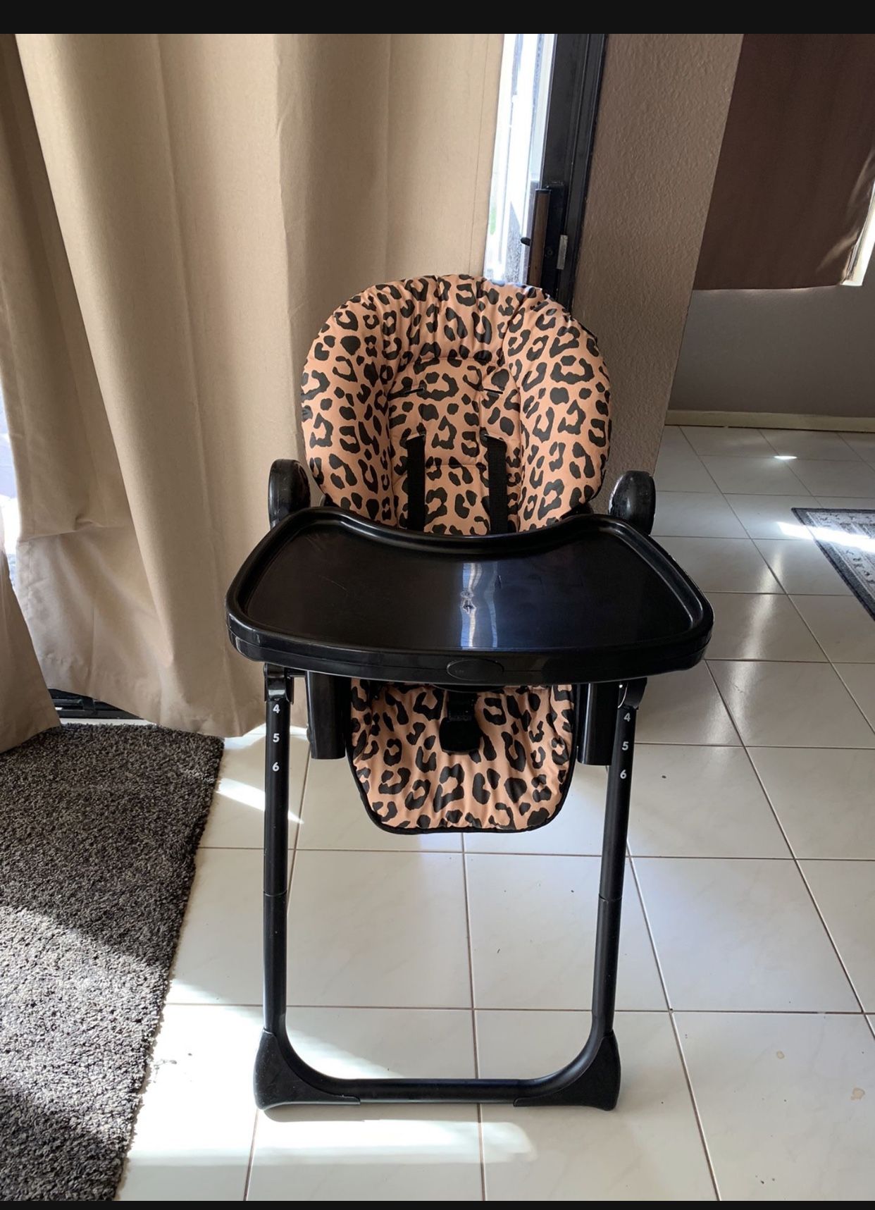 Cheetah print high chair sales