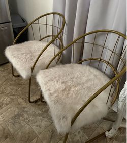 White & Gold fur chairs
