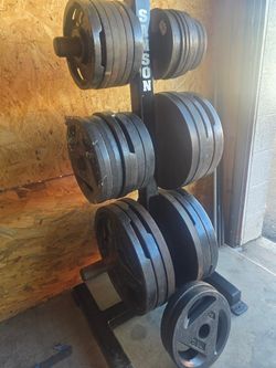 685 Lbs Of Olympic Weight Plates And Rack ❌ NOT SOLD SEPARATELY ❌