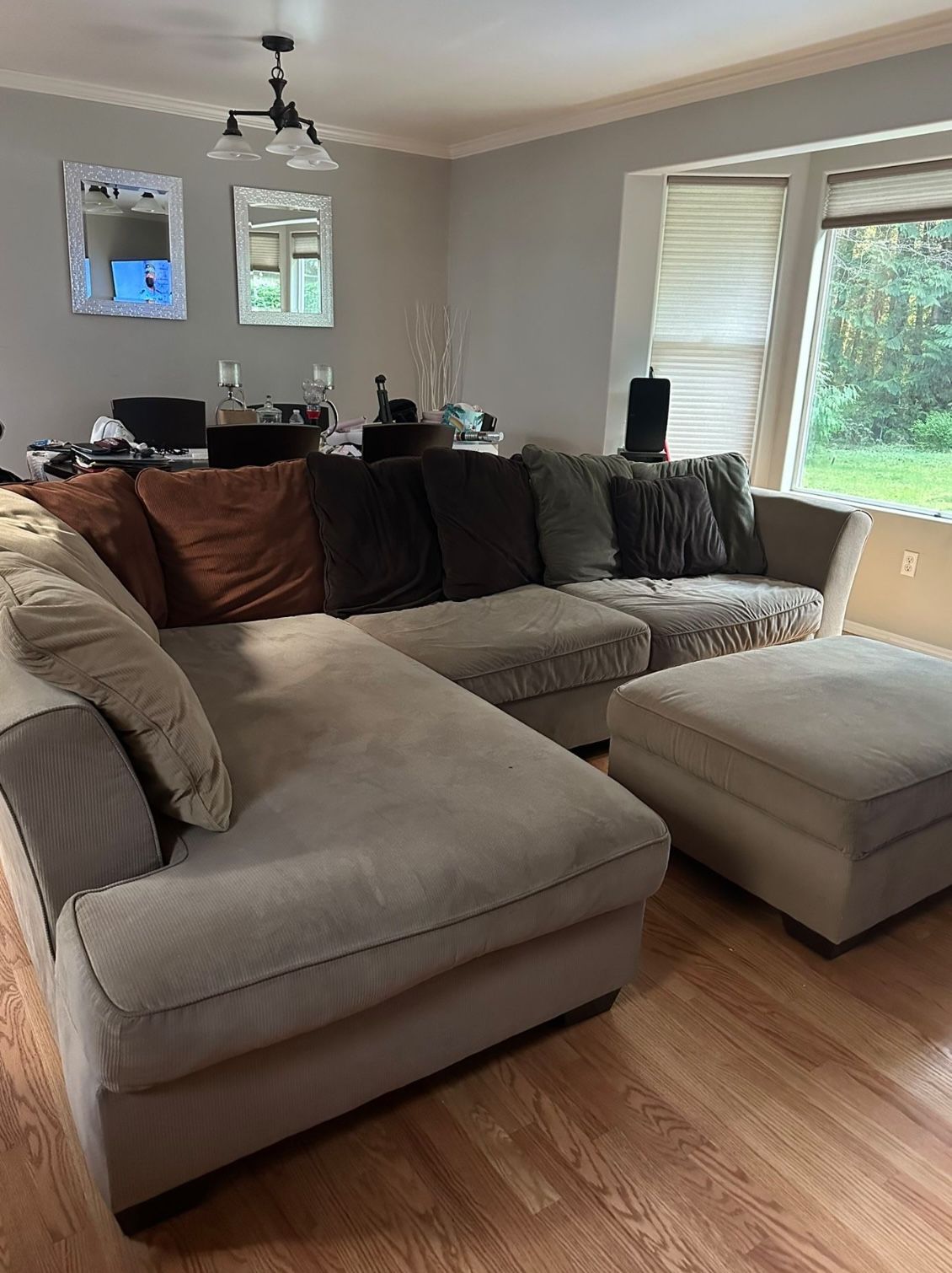 Elegant sectional couch with ottoman