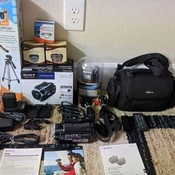 Sony Handycam HDR- XR 550V w/ Tripod, Carry Bag, And Other Accessories 