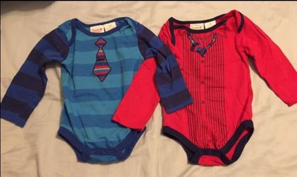 Two Truly Scrumptious, long sleeved onesies with ties. EUC. 9 mo. L