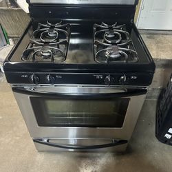 4 burner natural gas stove in good condition