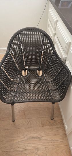 Janus et cie brown woven chairs