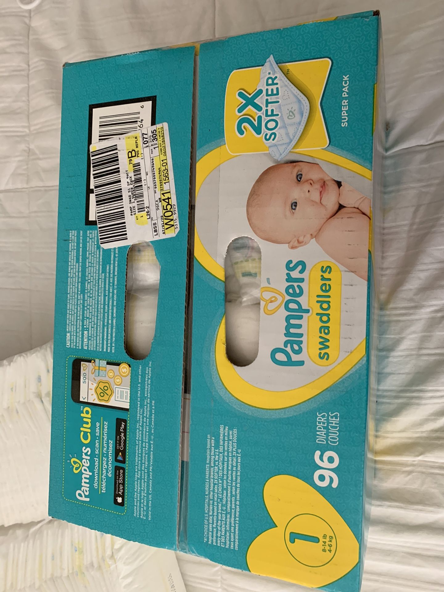 Brand new pack of SIZE 1 diapers + MORE