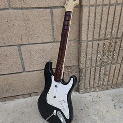 Fender Stratocaster wireless guitar controller designed for the Rock Band video game series. 