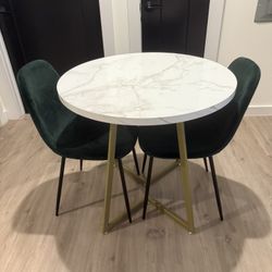 Table & Green chairs