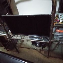 For sale metal golden Open Cabinet For TV up 32 inches (only cabinet nothing else included) 
Width: 60 X 16 X 80 inches
