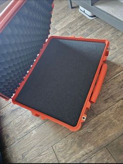 New orange Pelican 1600 Protector Case with Foam