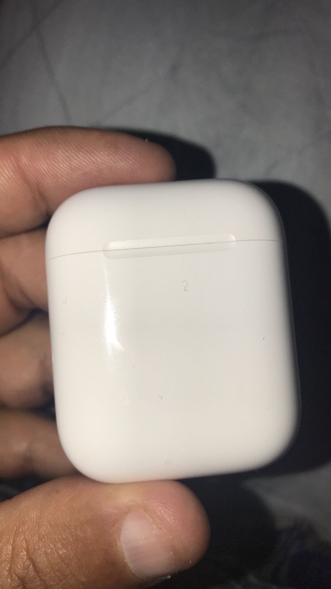Genuine Apple 2nd generation AirPods charger case in excellent condition.