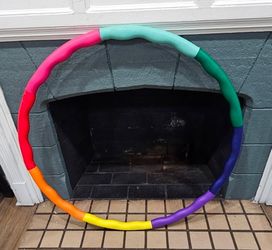 4lb. 8 colored weighted Heavy duty plastic hula hoop in Excellent condition.
W 40in.