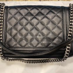 shoulder purse and Silver hardware.