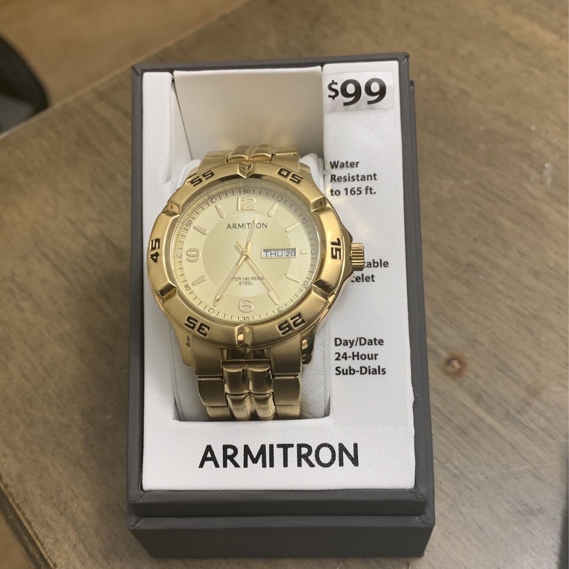 Armitron watch shop gold