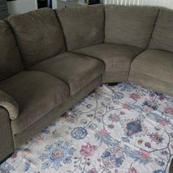 Large Brown Curved Couch