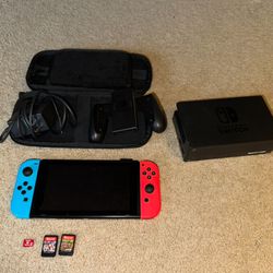 Nintendo switch with case and games 