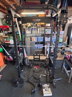 Like New Smith Machine, Weight Plates, & Barbells