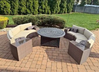 Outdoor seating with cushions and end tables