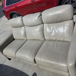 Light Gray Leather Sofa with Recliners on Both Ends