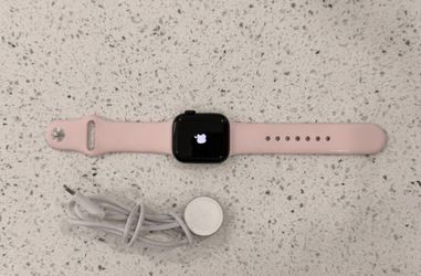 Apple Watch series 9 41 mm pink band and  a USB-C charger cabel oem