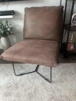 2 brown chairs