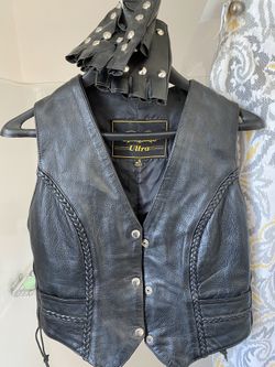 Women’s leather motorcycle vest and chaps