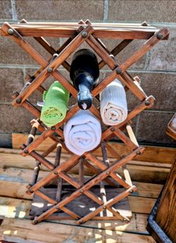 Wood rack for bottles or rolled towels, misc. Stand-alone shelf rack