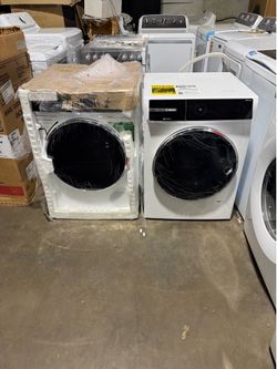 New 24” Bosch 500  series  stackble washer & electric dryer