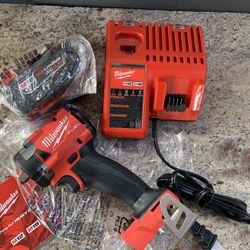 Milwaukee M18 FUEL GEN-3 18-Volt Lithium-Ion Brushless Cordless 3/8 in. Compact Impact Wrench with Friction Ring Kit Battery 5.0 And Charger 