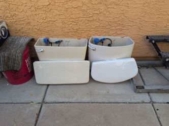 Two free toilet tanks