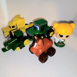 lot of assorted John Deere themed vehicles and toys 