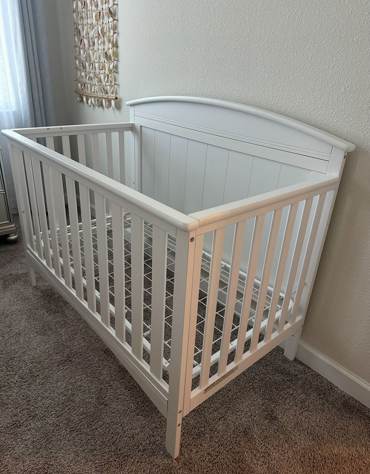 White Baby Crib Transforms From Crib To Bed