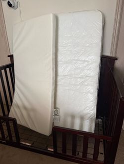 Storkcraft Steveston 4 in 1 Convertible Crib in espresso with Mattress, mattress pad, crib bumper and 2 bed rail guards. Like new.