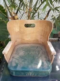 Vintage restaurant child's booster seat.