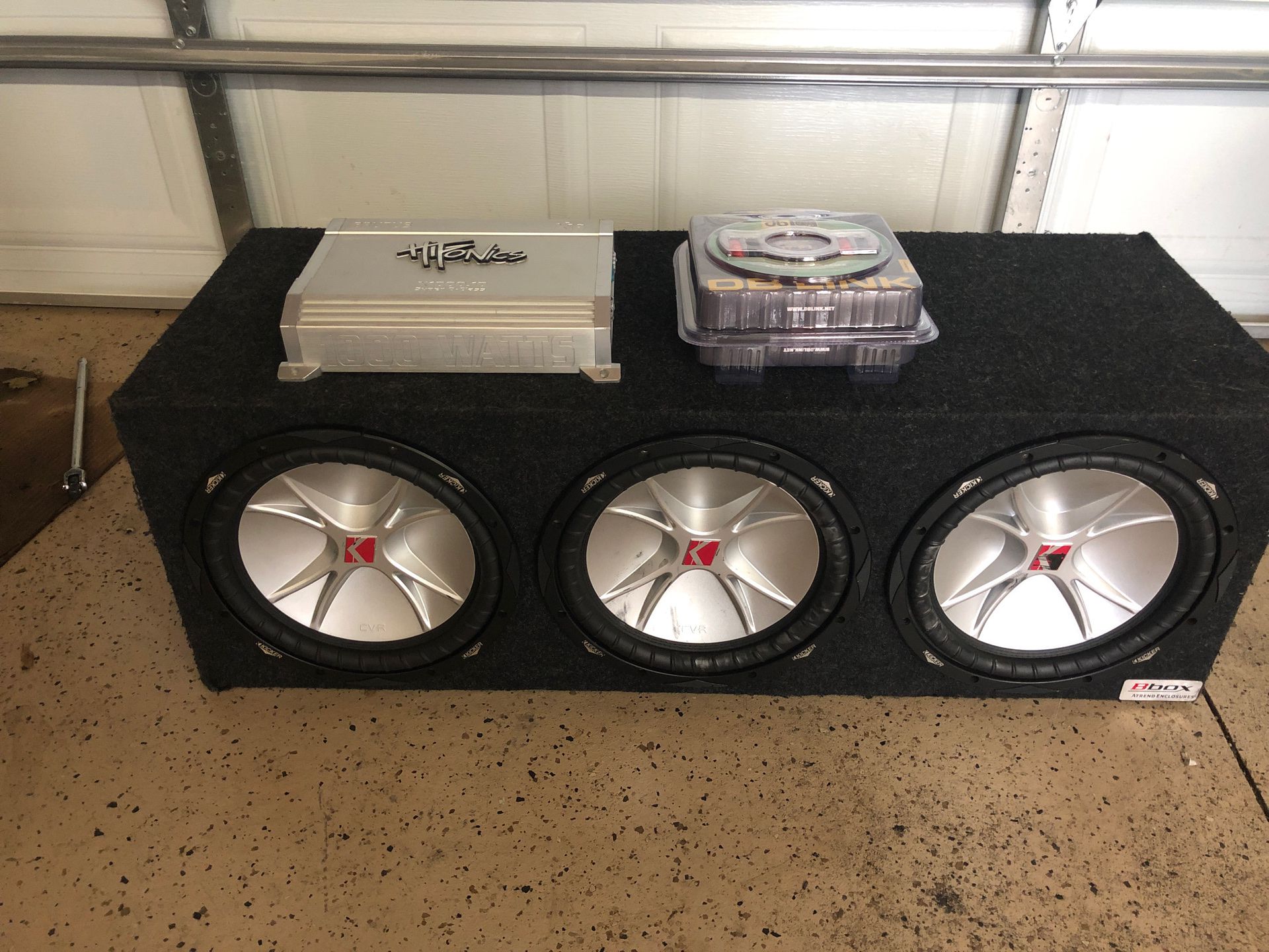 3 12 Kicker Cvrs in box with Brutus amp and wires español/English
