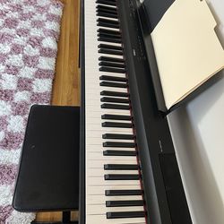 Yamaha weighted keyboard and adjustable stool