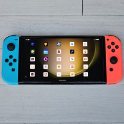 Nintendo Switch OLED  200 Games + 10000 Retros + Movies 