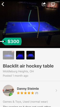 Blacklit air hockey table