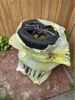 Snow tires and rims - 28 inch snow tire