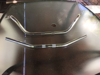 Two motorcycle handle bars