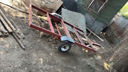 Foldable flat bed trailer
