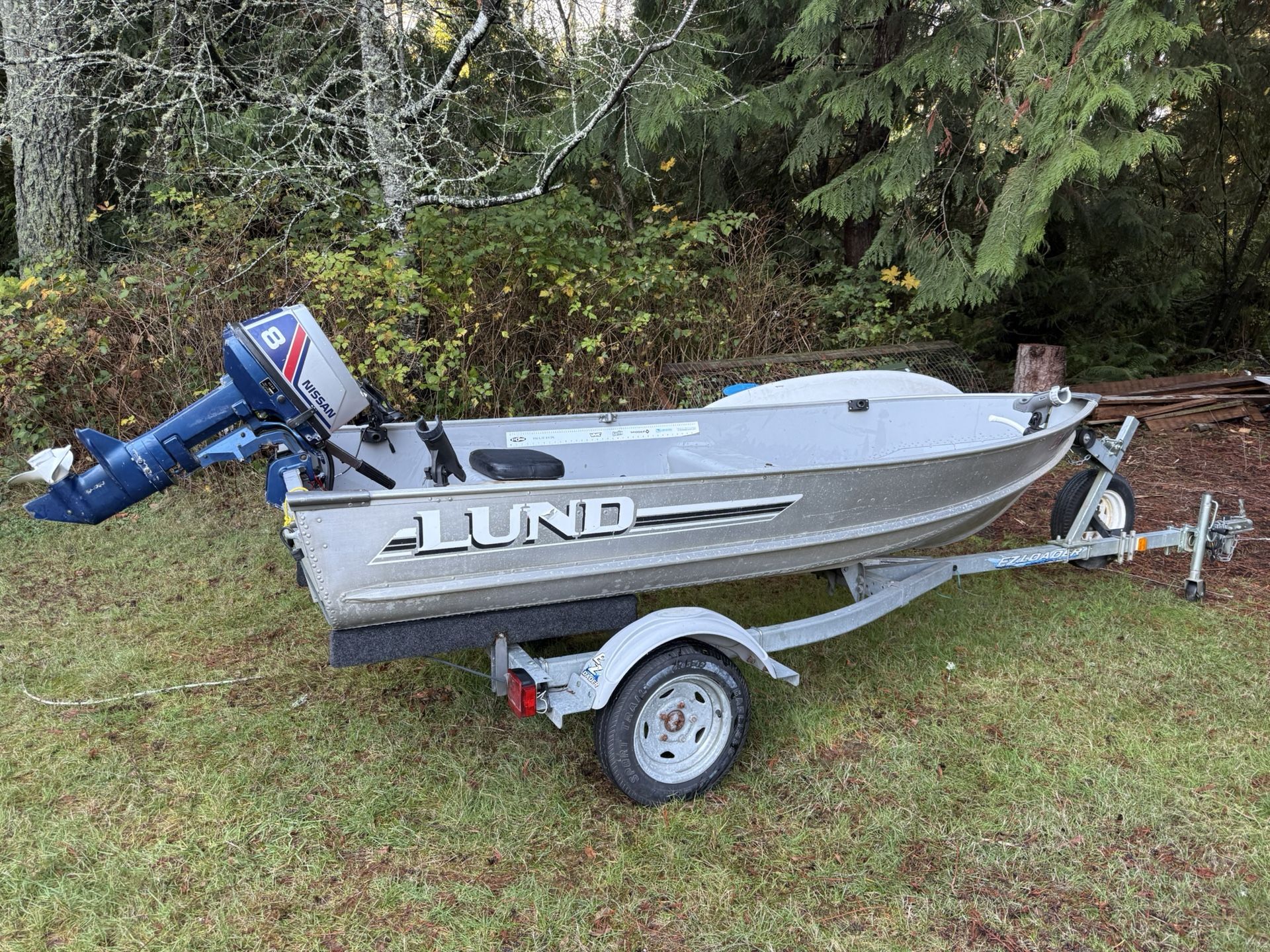 Lund WC-12 Fishing Boat & 8hp Nissan Outboard