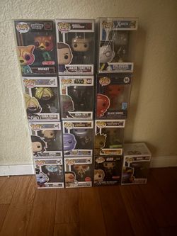 funko pops (protectors on)