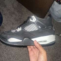 white and black jordan 4s