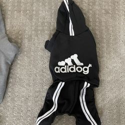 Used dog clothes and harnesses