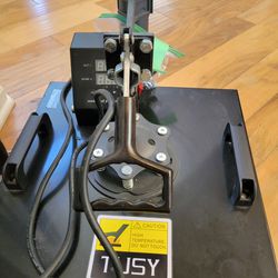 Tusy 15 X 15 Swing Away Heat Press and attachments. ***The control box needs to be replaced.*** All attachments are new.